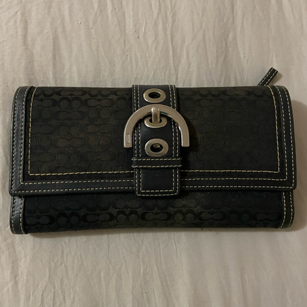 Coach classic wallet! Black with white stitching.